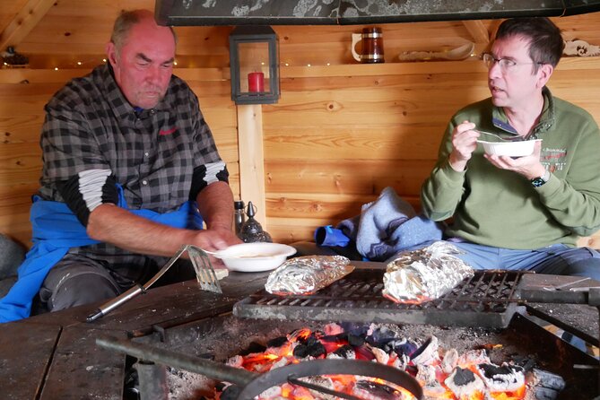 Fishing from shore - Outdoor Norwegian cooking: fire, grill cabin, or private home