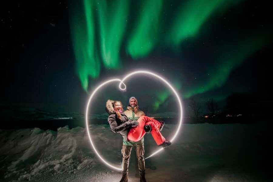 From Tromsø: Aurora Borealis Tour - Meet at Scandic The Dock, then settle into the 19-seat ride