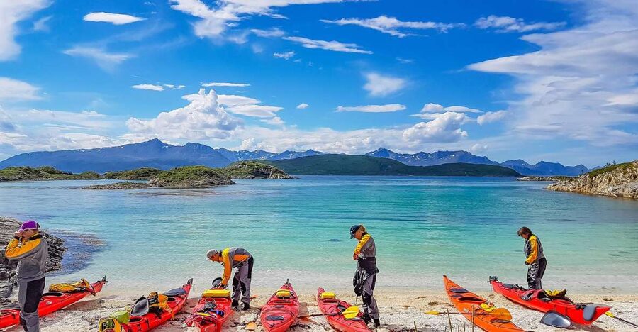 From Tromsø: Kayak trip with lunch and sauna at Sommarøy - Kayak center time: fitting drysuits and learning safe paddling