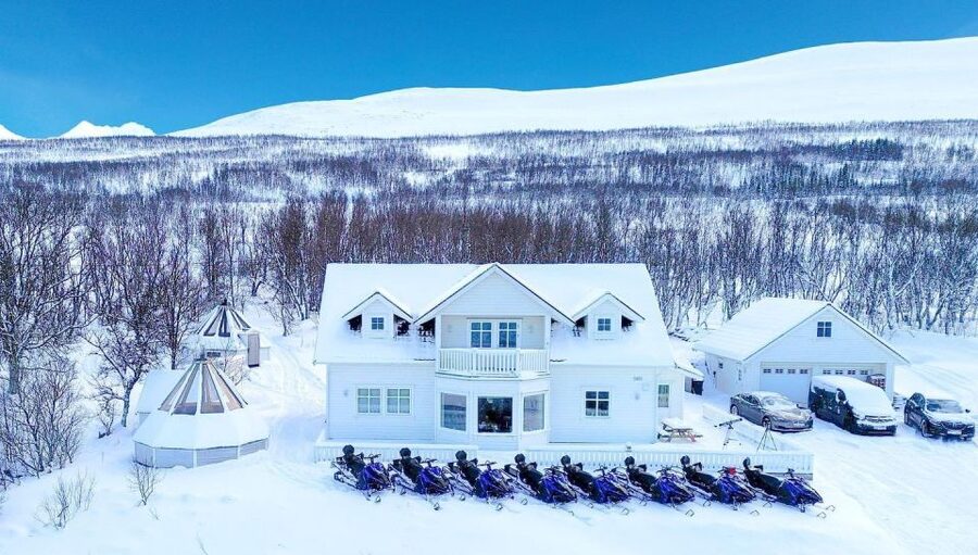 From Tromsø: Lyngen Alps Guided Snowmobile Tour - The Lyngen Alps snowmobile safari: the views you come for