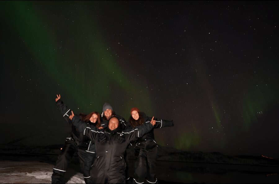 From Tromsø: Northern Lights Tour in Minibus with Photos - Warm Suits, Shoe Spikes, and Head Lamps, the Real Winter MVPs