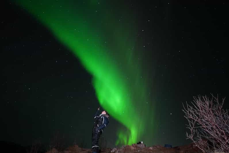 From Tromsø: Northern Lights Tour with Hot Drinks and Photos - Staying Warm for Hours: Warm Suits, Shoe Spikes, Head Lamps, and Hot Drinks