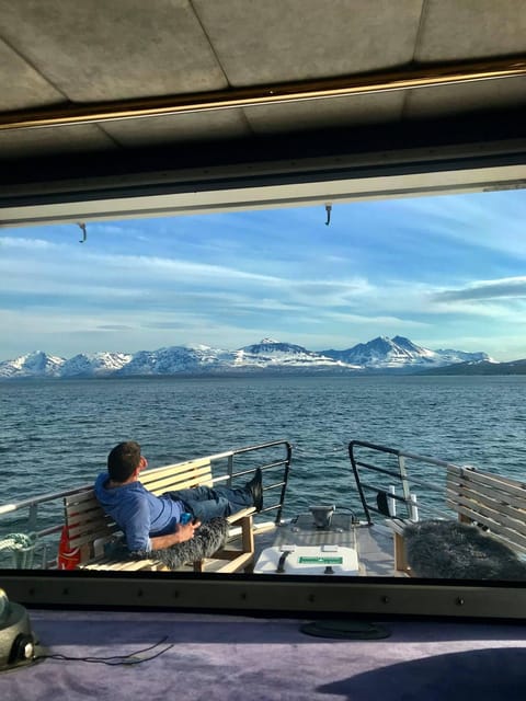 From Tromso: Polar Fishing Adventure - Life on the Capella: insulated suits, rods, safety, and warm drinks