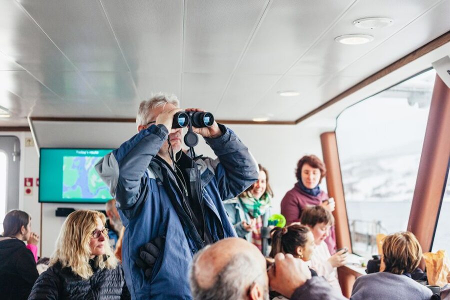 Tromsø: Arctic Fjord Cruise With Stop On Land At Fish Racks - Hybrid-electric catamaran comfort: warmth, sightlines, and simple onboard extras