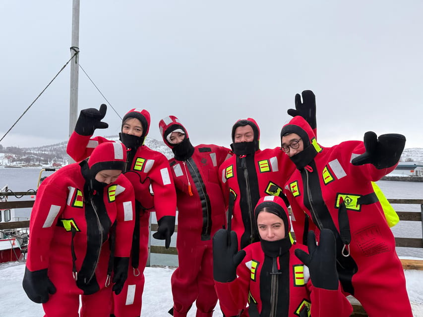 Tromsø: Arctic Fjord Floating in Survival Suit - The Ice Water Swim: Guided, Playful, and Safer Than You Expect
