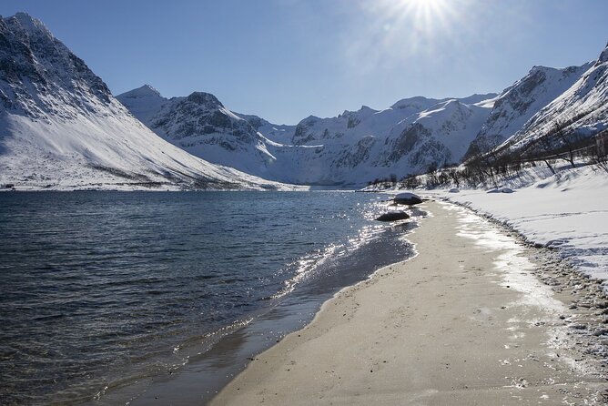 Tromso fjords road trip with fire in grill cabin by the beach. - Why this Tromsø fjords road trip feels practical, not touristy