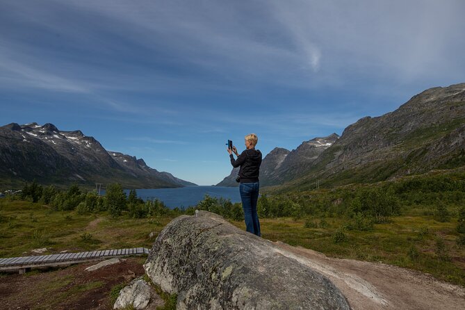 Tromso fjords road trip with fire in grill cabin by the beach. - Stop at Grøtfjord: the white sand beach under mountain walls