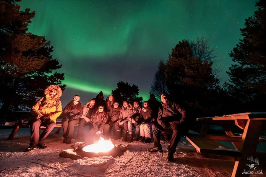 Tromsø: Northern Lights Chase by a comfortable bus - Meeting at Magic Ice Bar, Then Settling In for the Long Arctic Evening