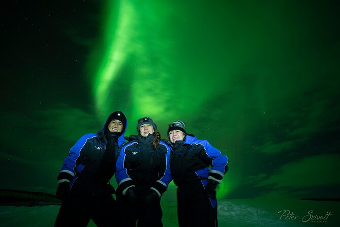Tromso Northern Lights Minibus Chase Small Group Tour with Photos - The chase night: drive, switch spots, and wait for breaks in the clouds