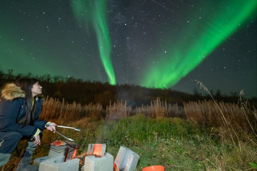 Tromsø: Northern Lights Tour w/Photo, Suits and Local Guide - The timing game: pickup, base camp, and how the night starts