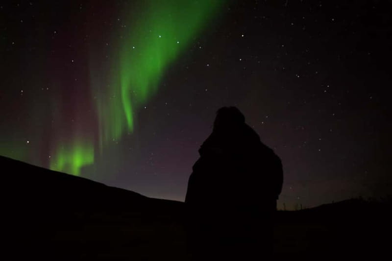 Tromsø: Northern Lights Tour - How the minibus chases clear skies around fjords and valleys