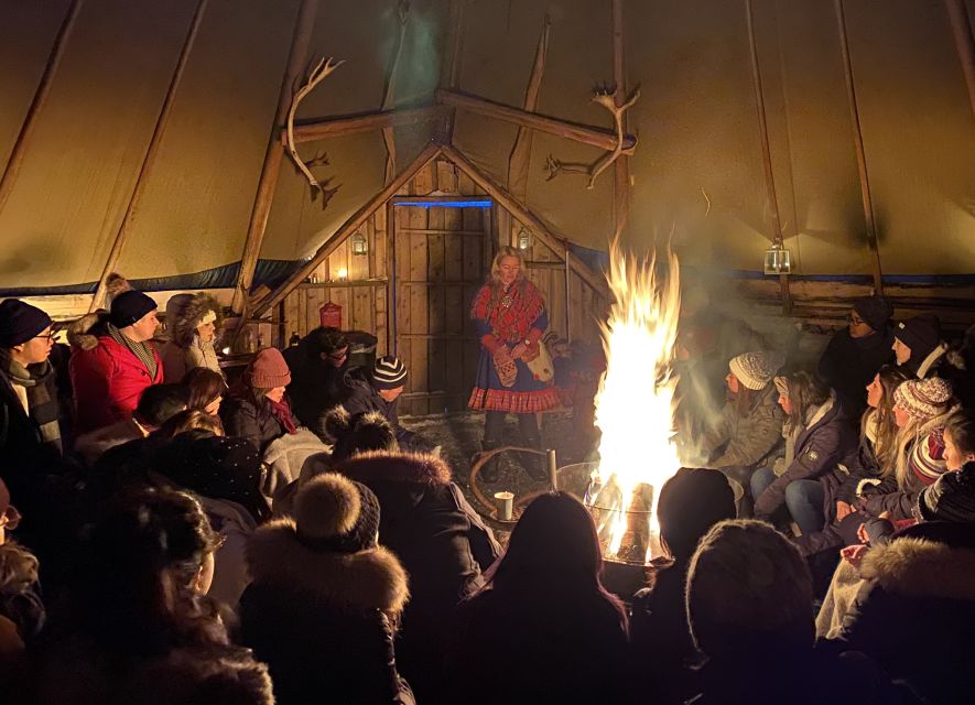 Tromsø: Reindeer Camp and Sami Cultural Tour with Lunch - The short walk to the huts: plan for snow, cold air, and boots that grip